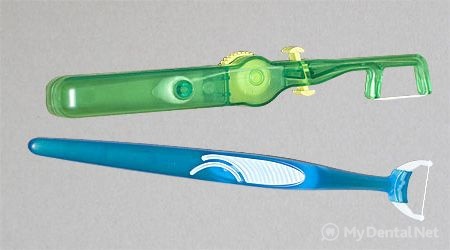 Почему важно использовать зубную нить?